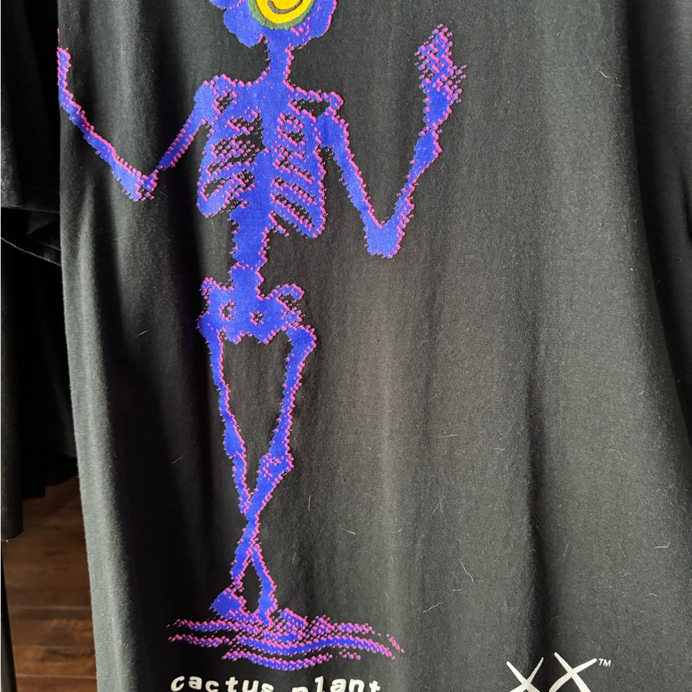 Cactus Plant Flea Market x KAWS shirt